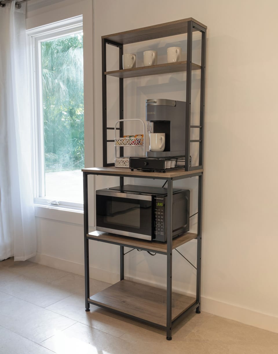 A fully-stocked coffee bar with complimentary Keurig coffee, decaf, and teas.