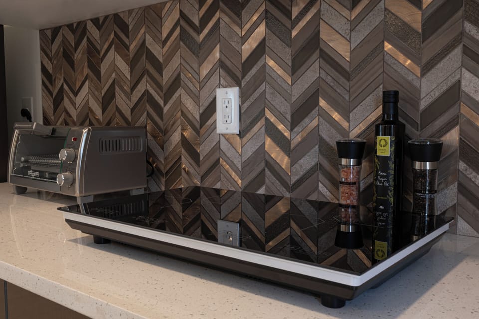 A Fast heating Two burner Induction cooktop and air-fryer toaster oven.