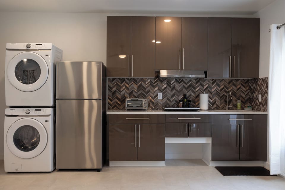 A full-sized refrigerator and freezer - Samsung washer/dryer for your use