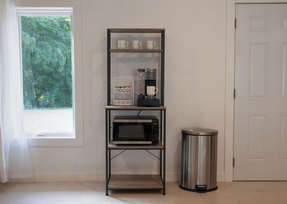 A fully-stocked coffee bar with complimentary Keurig coffee, decaf, and teas.