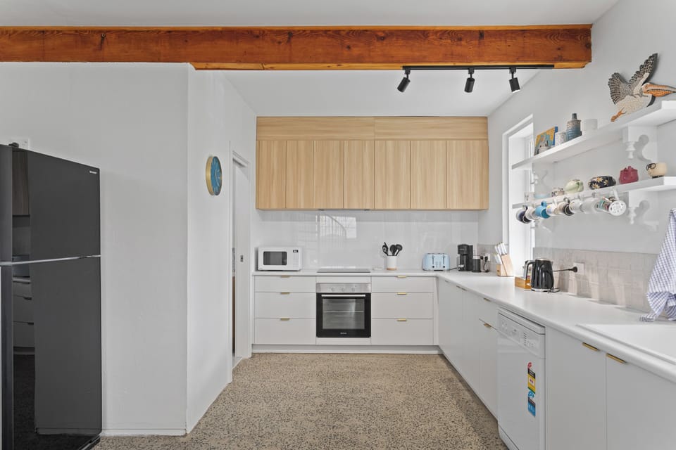 Prepare home-cooked meals in the fully-equipped, modern kitchen