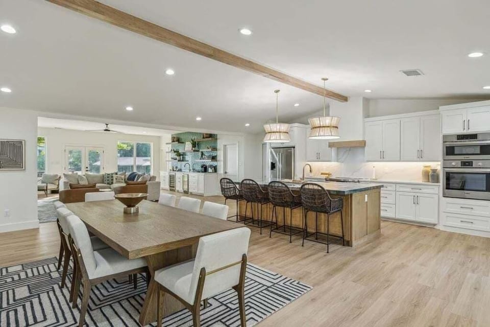 Open concept living with kitchen seating for 14.