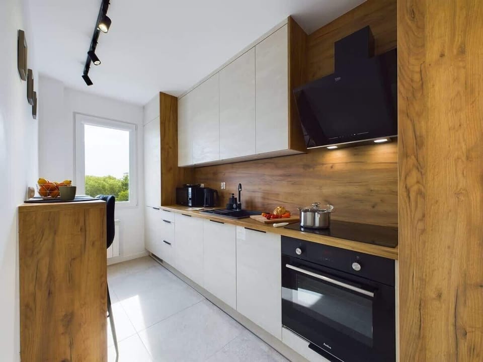 The kitchen's modern appliances make meal preparation easy.