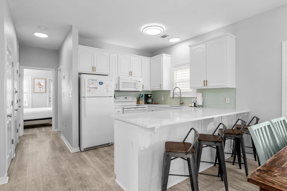 Spacious Kitchen With Bar Seating