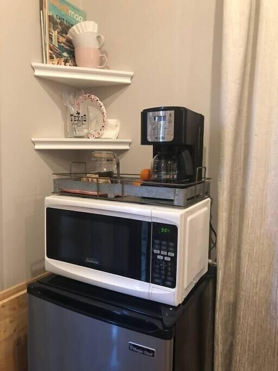 Stocked mini fridge, microwave, coffee & coffee maker, utensils