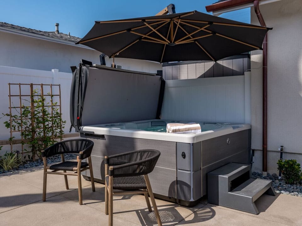 Experience ultimate relaxation in our outdoor jacuzzi.