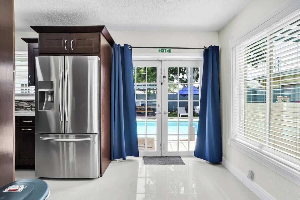Modern Kitchen | Facing backyard and Pool | Fridge and Freezer