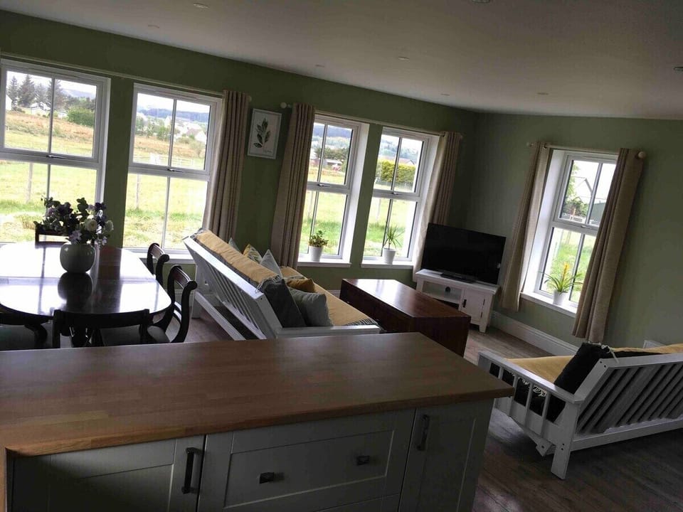 Open plan kitchen and livingroom with 2 sofa beds