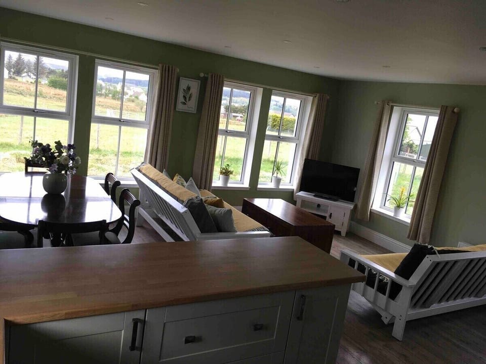 Open plan kitchen and livingroom with 2 sofa beds