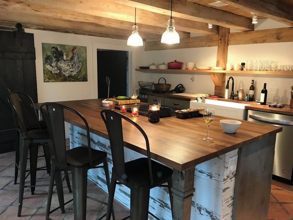 Fully stocked kitchen, the island is always a gathering station