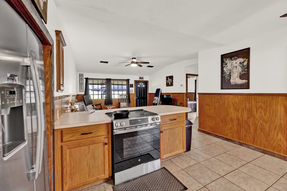 Kitchen includes new refrigerator & stove for all your cooking needs