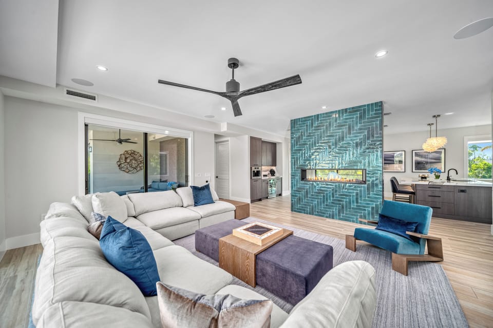 Sink into cozy comfort as the fireplace flickers, setting a warm and inviting mood for relaxing evenings with loved ones.