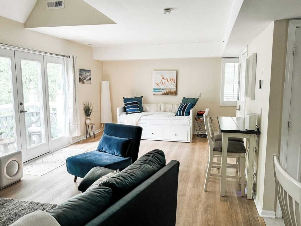 Enjoy an open floor plan with water sounds from the properties  koi pond fountain right outside your door.