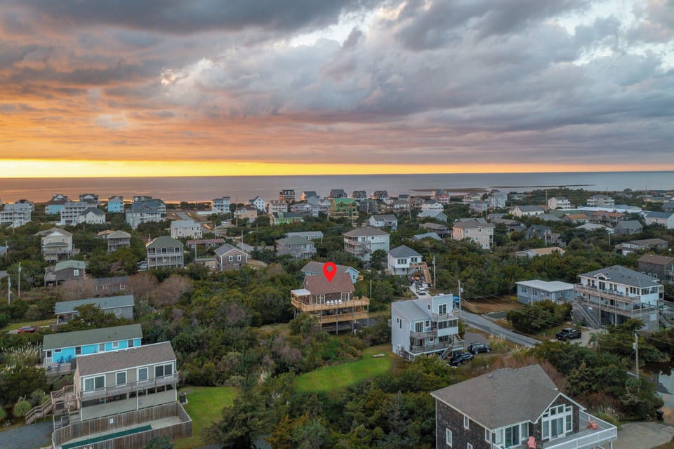 Aerial view of the property. Two minute walk to the beach.