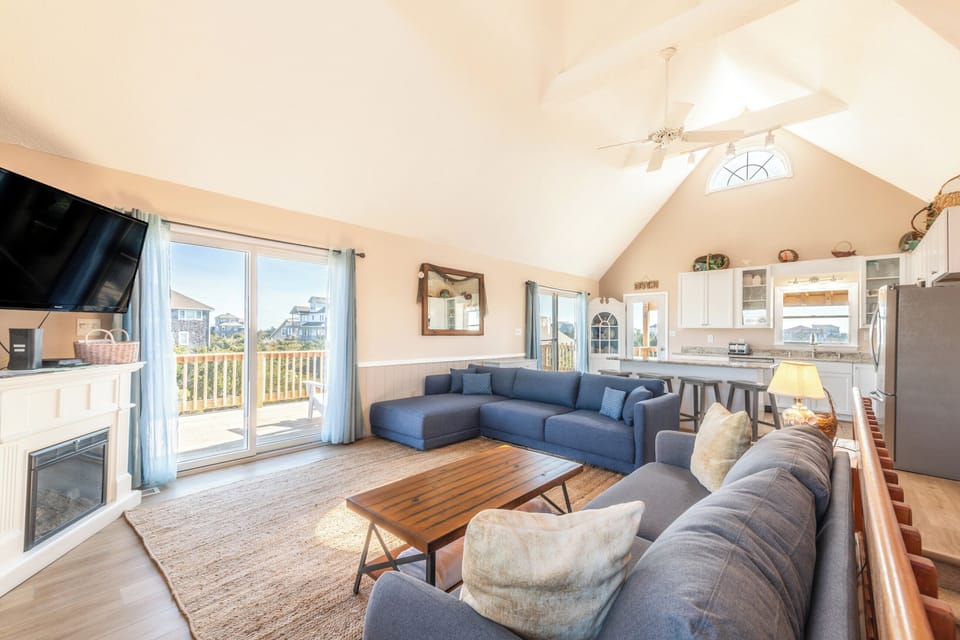 The living room is equipped with a Smart TV. Access popular streaming services.