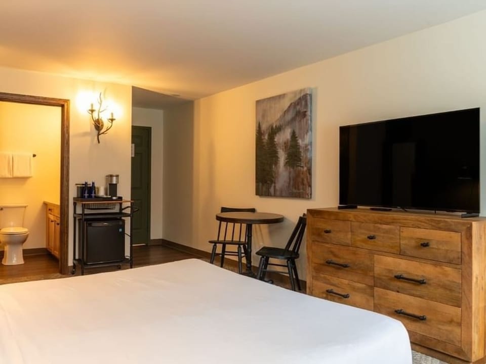 Settle in for movie night with TV and cozy seating.