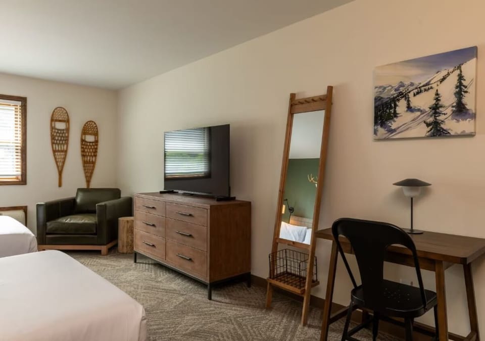 Catch up on emails at the simple desk and comfy chair.