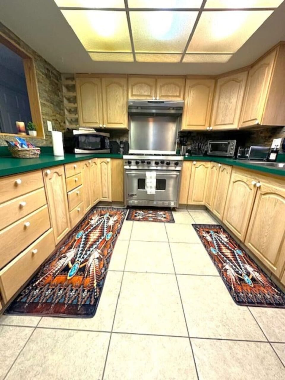 Gourmet Kitchen with 6 burner Viking Gas stove. Plenty of Utensils and cookware for your meal preparations. Microwave, toaster, crock pot etc