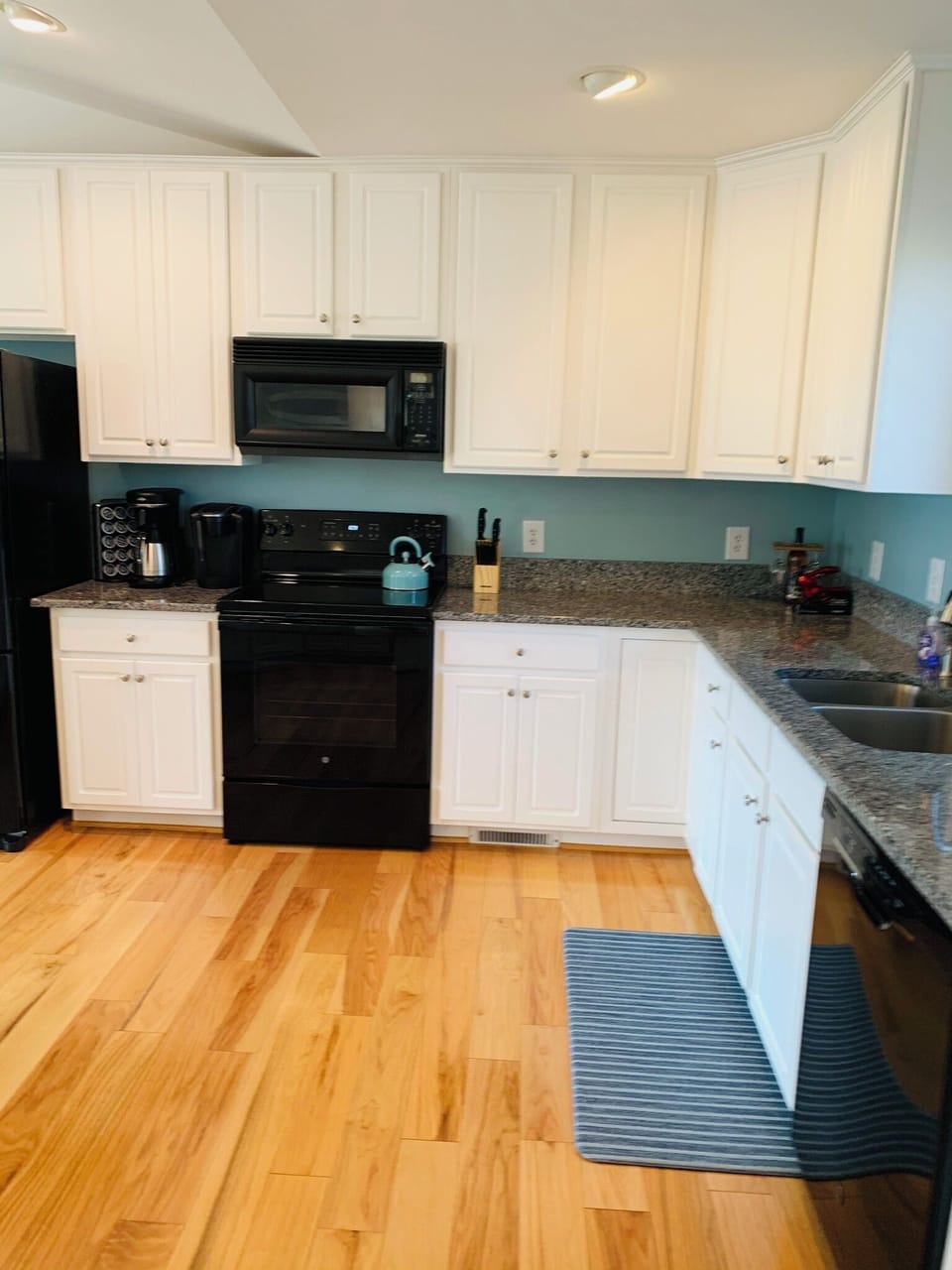Open Concept Family, Dining & Kitchen area. Great views of lake & for gathering!
