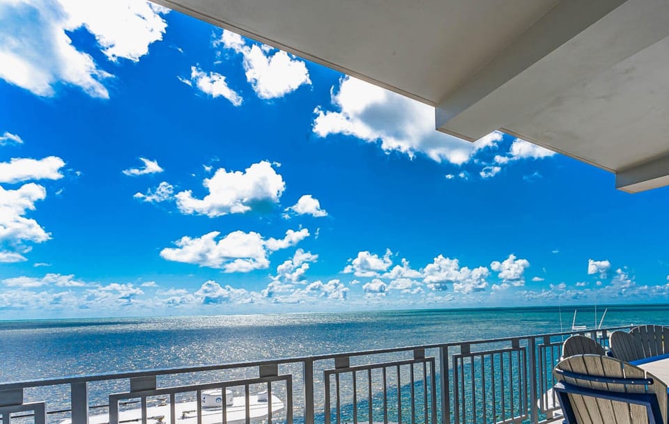 Enjoy stunning ocean views from the patio attached to the living room