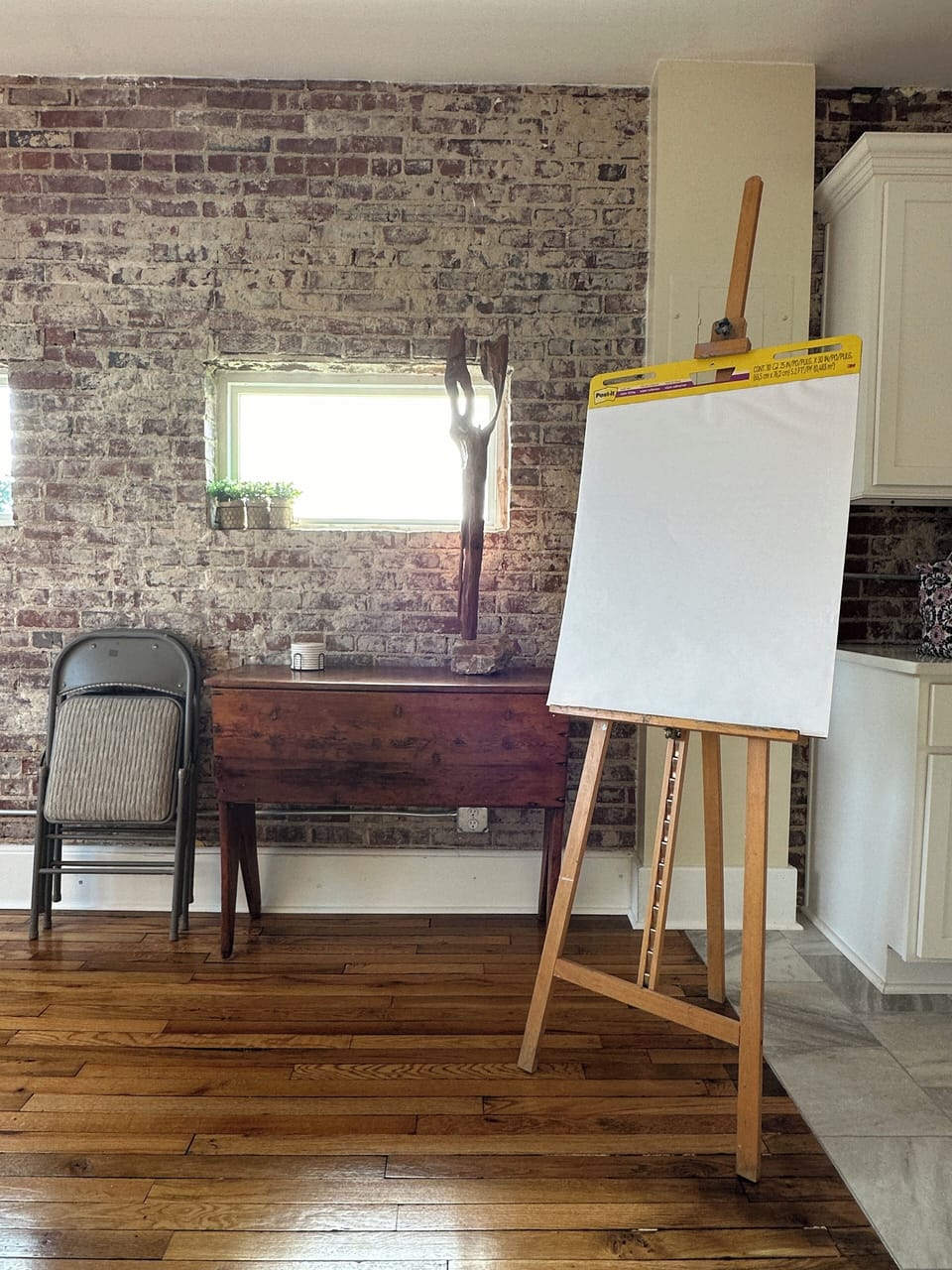 The dining room can be set up for a board meeting. 