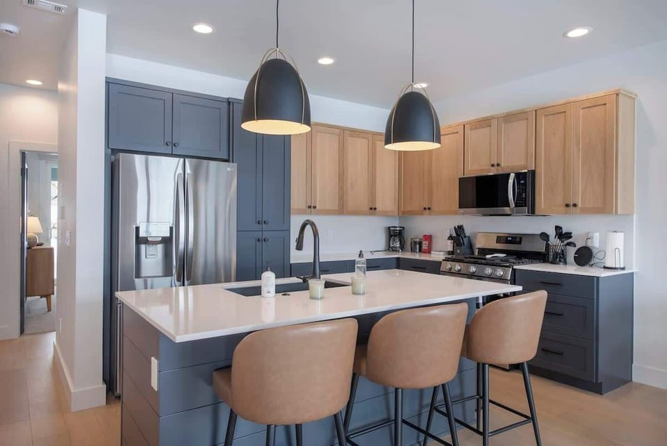 Enjoy a brand new, fully stocked kitchen that's great for cooking and hanging out with the family in the great room. 

Seat up to 9 people comfortably at the center island and dining table.