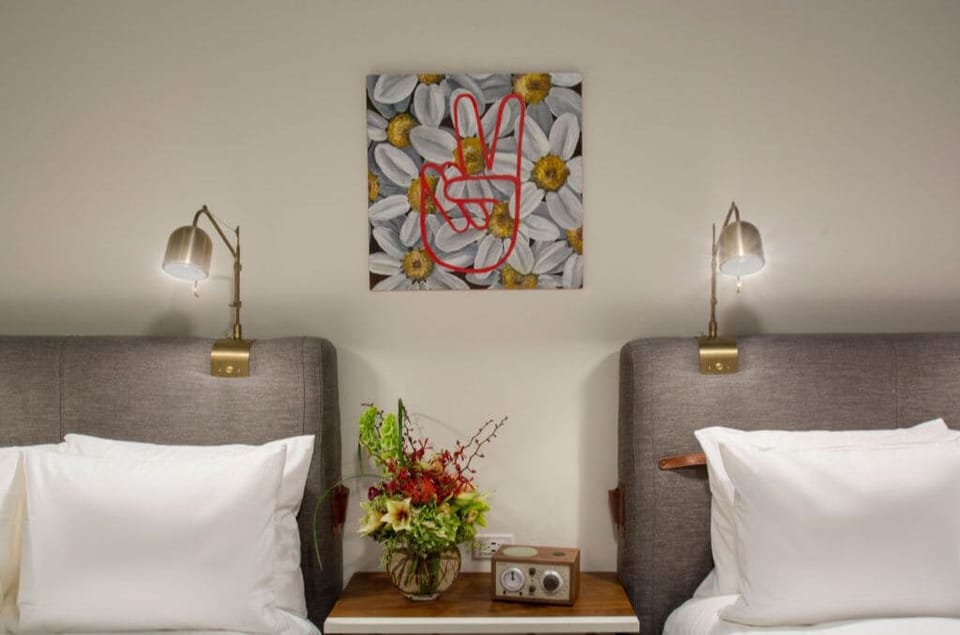 Bedroom corner with colorful art to inspire dreams and creativity