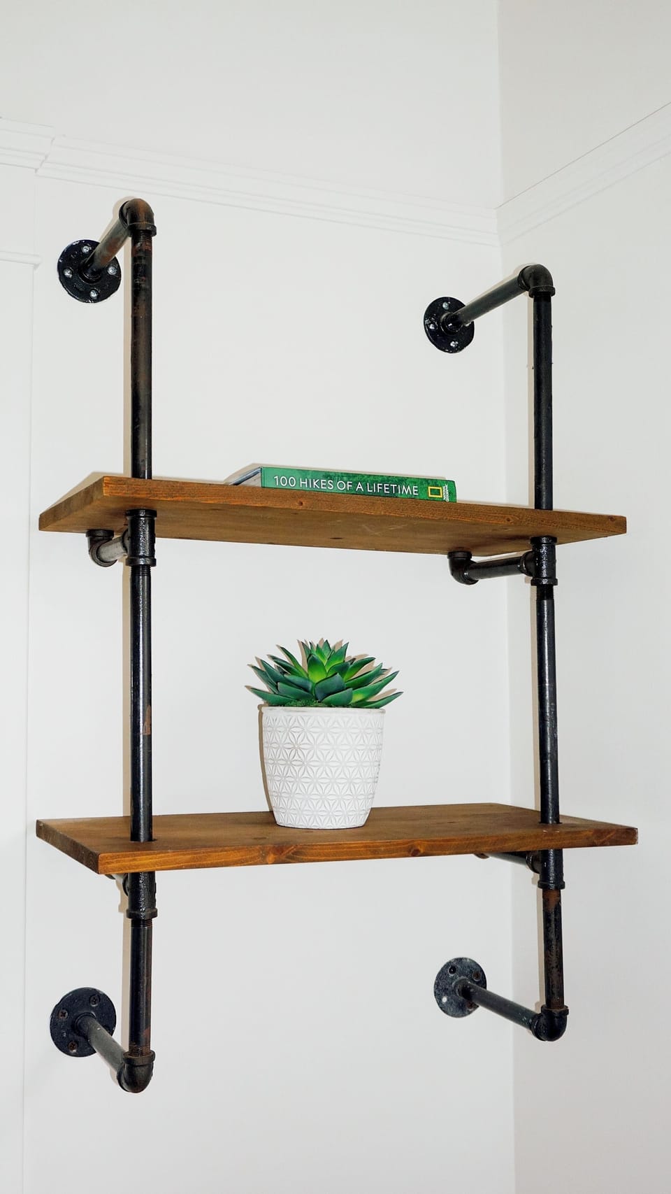 Industrial-inspired shelf -- for your favorite book or a candle to set the mood