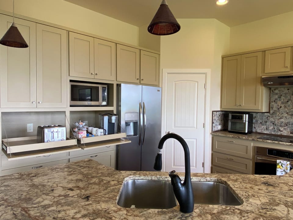 Fully stocked kitchen w/ toaster, coffee maker, air fryer, microwave & blender. 