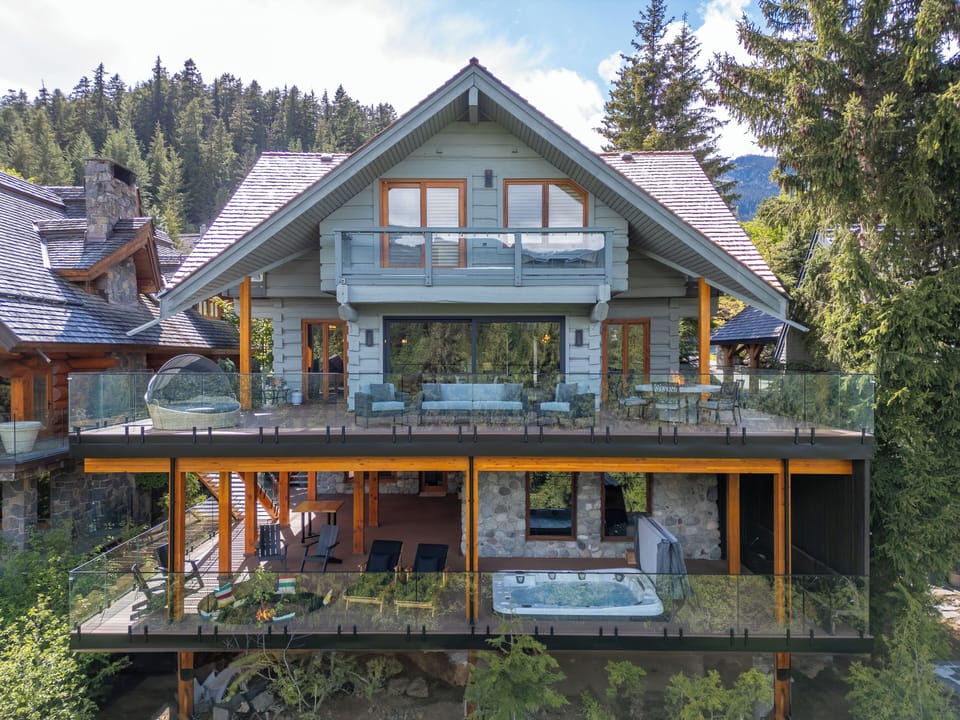 Aerial shot of the back two outdoor decks. 