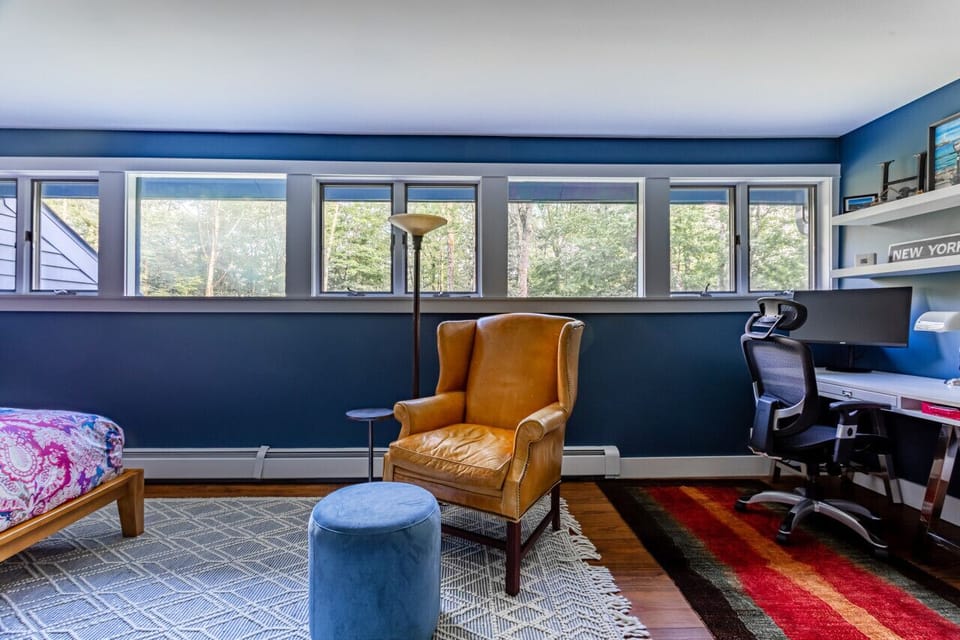 Tranquil bedroom with comfortable armchair