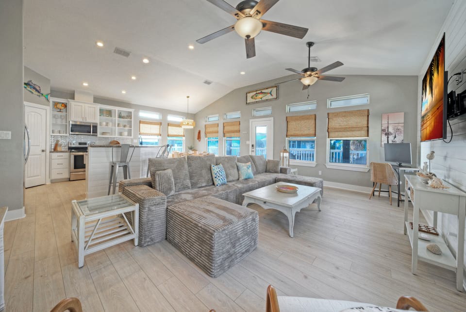 Living room offers comfortable seating and a sleeper sofa.