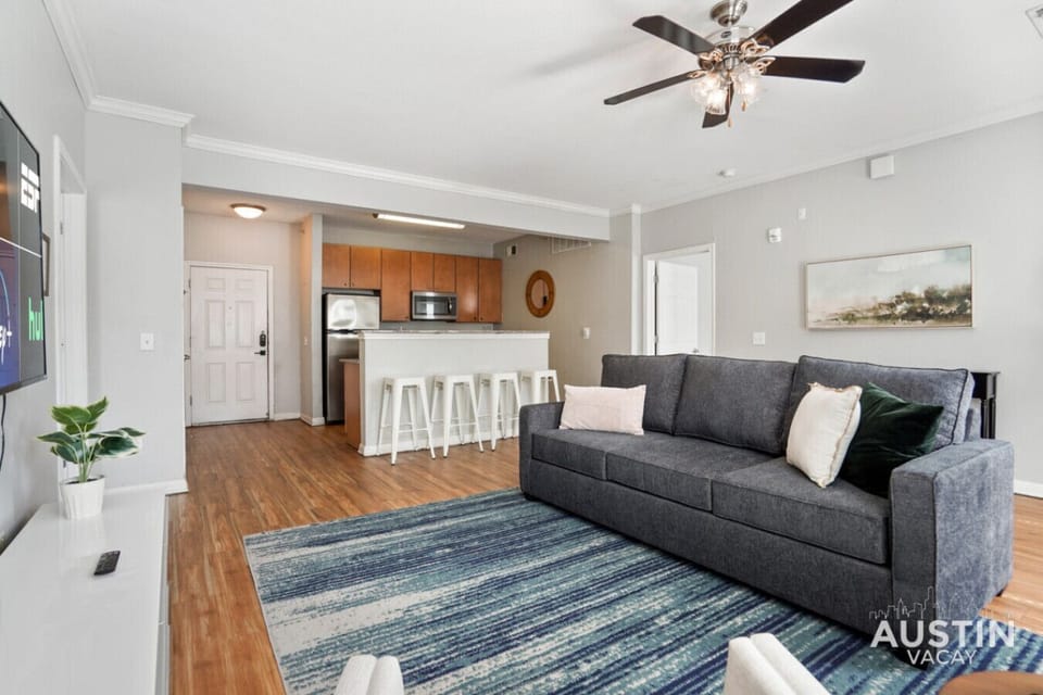 Open living room with sleeper sofa and smart tv