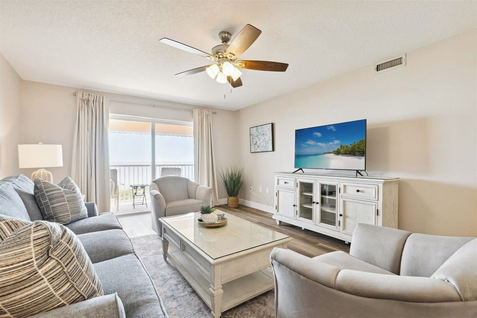 Relax in a bright and airy living room filled with natural light, and stunning view.