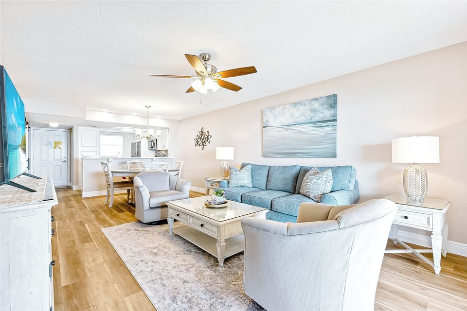 A welcoming, open-concept living area with stylish décor, inviting you to unwind in style.