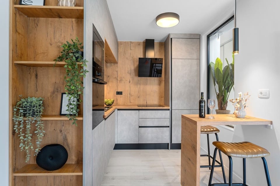 Kitchen equipped with high-end appliances and tasteful decor