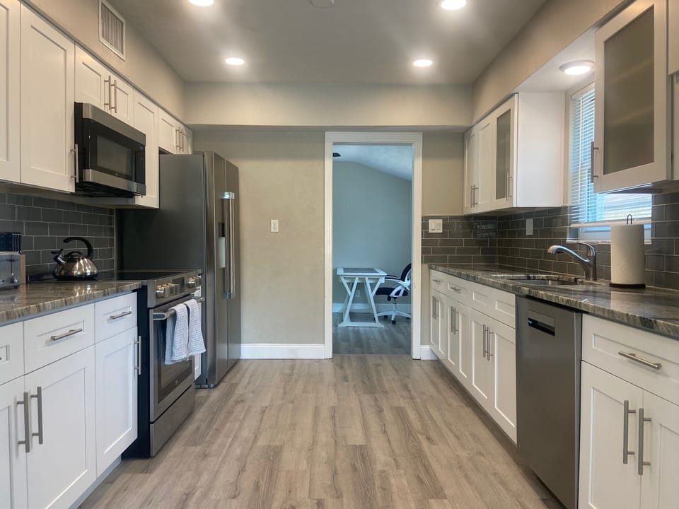 Modern-style kitchen, fully equipped for your convenience.