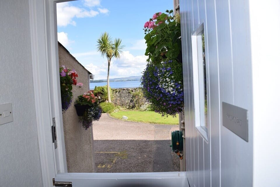 Private stable door entrance with sea views