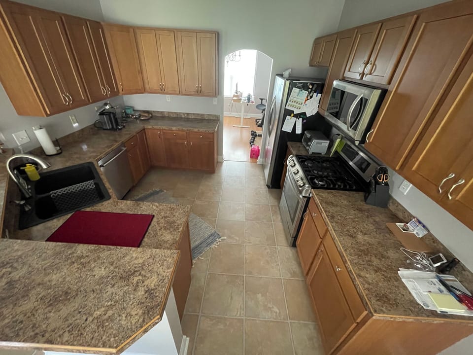 Complete with gas range, microwave, small toaster oven, coffee makers. 