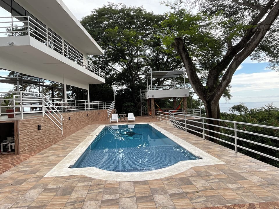 A beautiful view of the ocean from the pool
