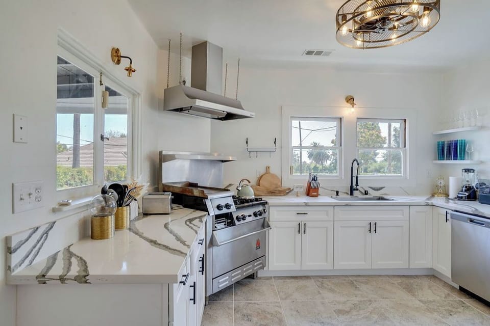 This kitchen combines style and functionality, making it the heart of your stay.