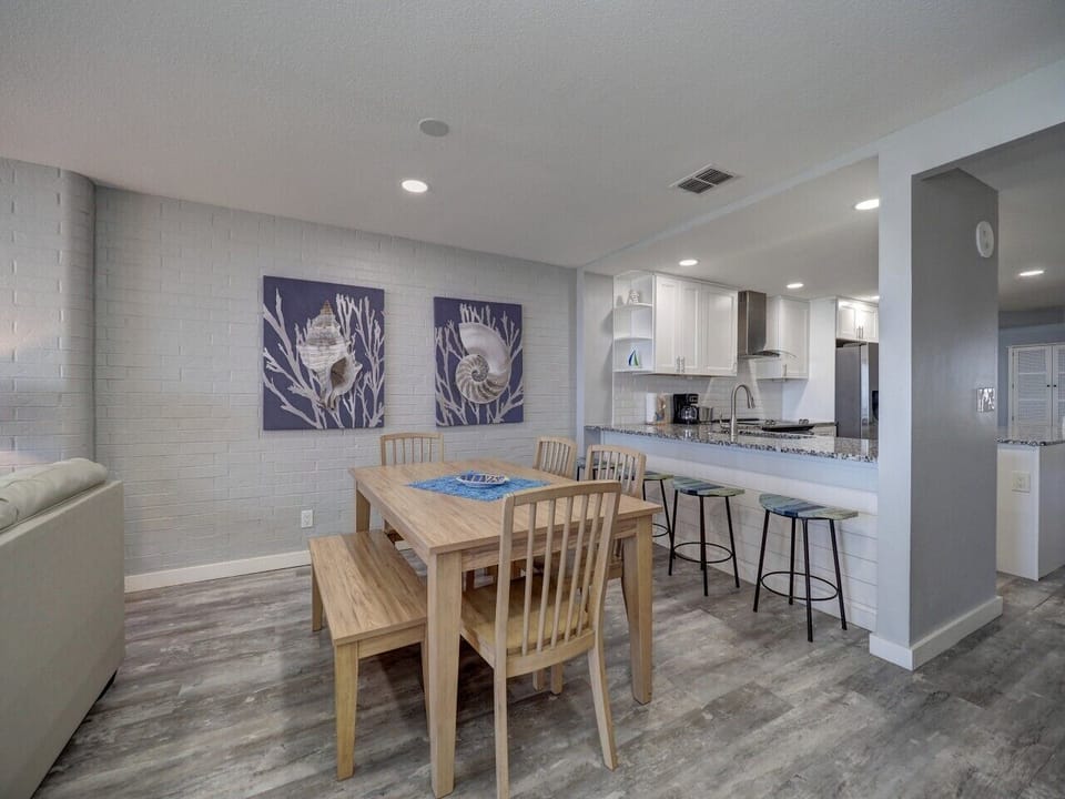Dining Area with Breakfast Bar Seating & Updated Kitchen