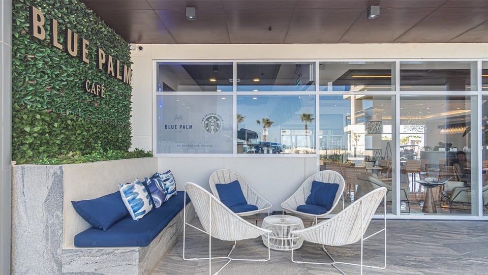 The blue Palm Cafe with its outside bistro seating.