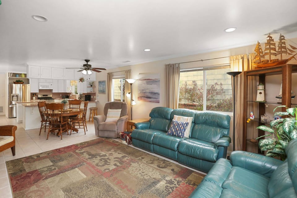 Comfortable and spacious living room, dining area, and kitchen!