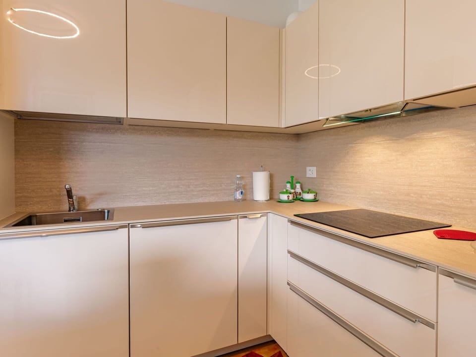 Cabinetry, Countertop, Property, Kitchen Sink, Sink, Kitchen Appliance, Tap, Kitchen Stove, Kitchen, Wood