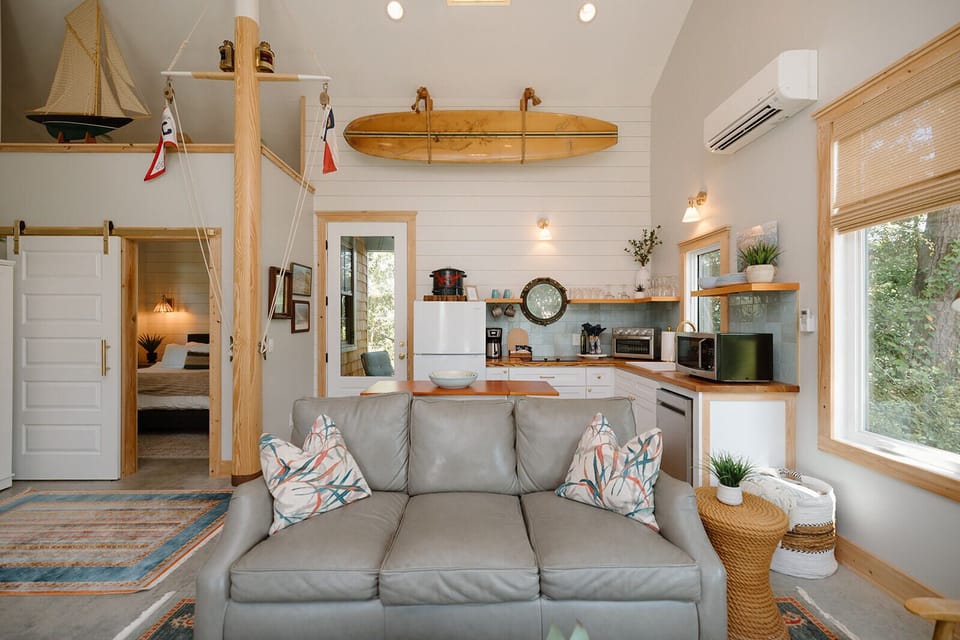 Vaulted ceilings, & nautical details flowing into the kitchen and king bedroom