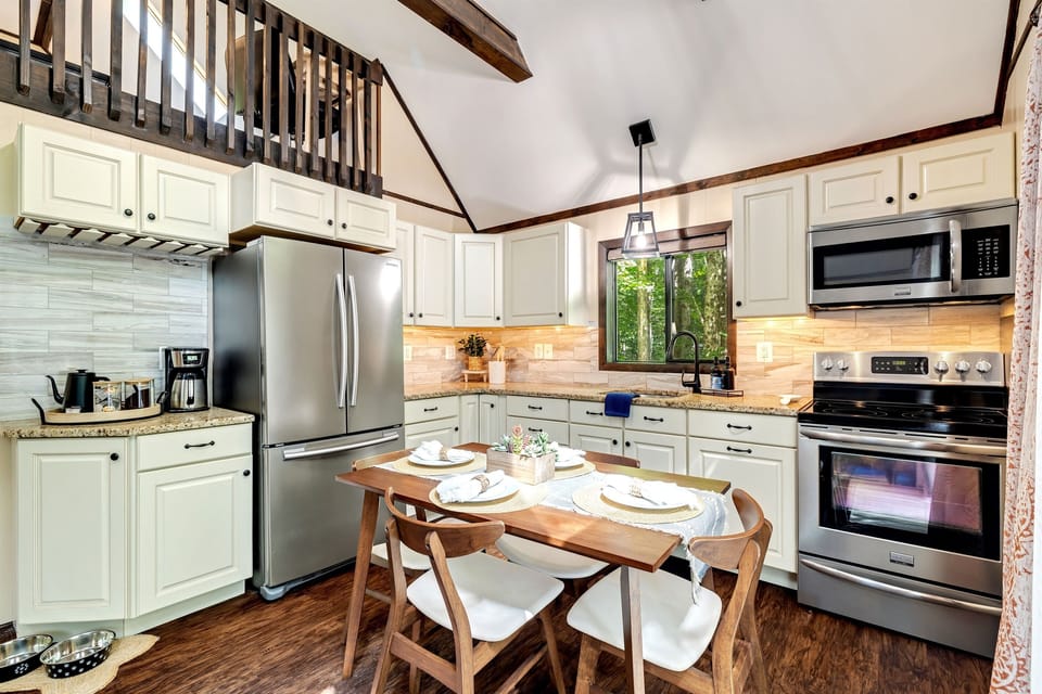 Kitchen with granite countertops and modern appliances