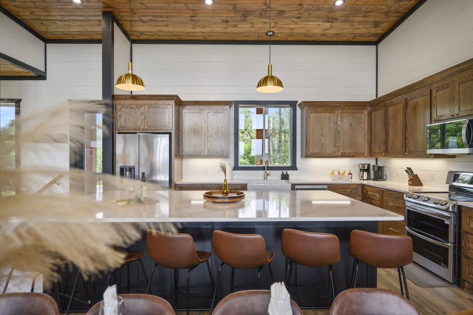 A fully equipped kitchen ready to handle everything from a relaxed morning breakfast to a full group dinner at the end of a long day.