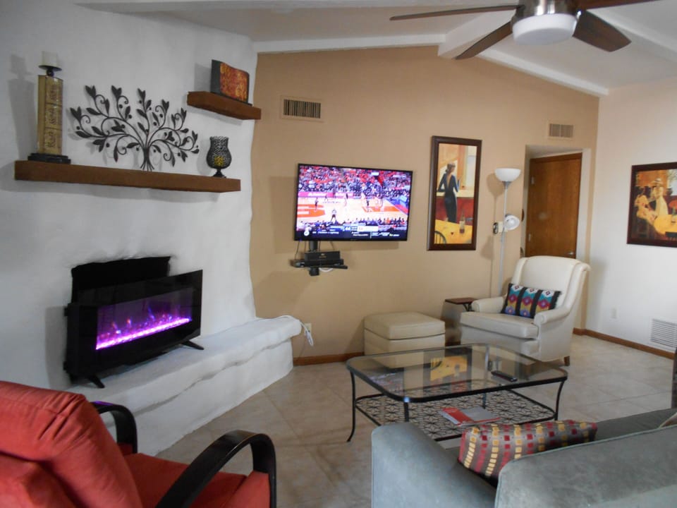 Great Room Vaulted ceiling 55" TV Sleeper Sofa, leather chair & Recliner
 