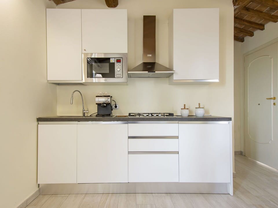 Cabinetry, Countertop, Building, Sink, Kitchen Stove, Kitchen, Interior Design, Wood, Kitchen Appliance, Flooring